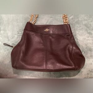 New COACH leather bag. Chocolate brown with gold chain handles. The newest look!